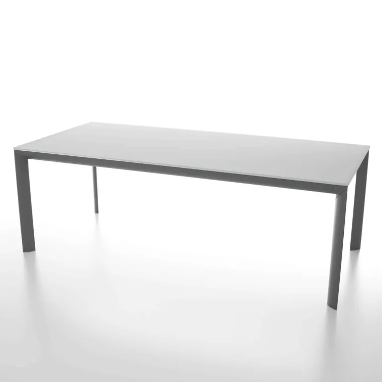 Cocoon Table rectangulaire extensible en verre trempé et pieds en métal fabriquée en Italie